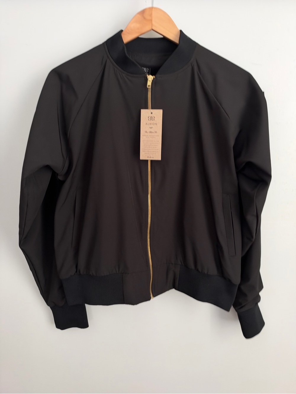 Albion Black Bomber Jacket with Gold Zipper. New with tags.